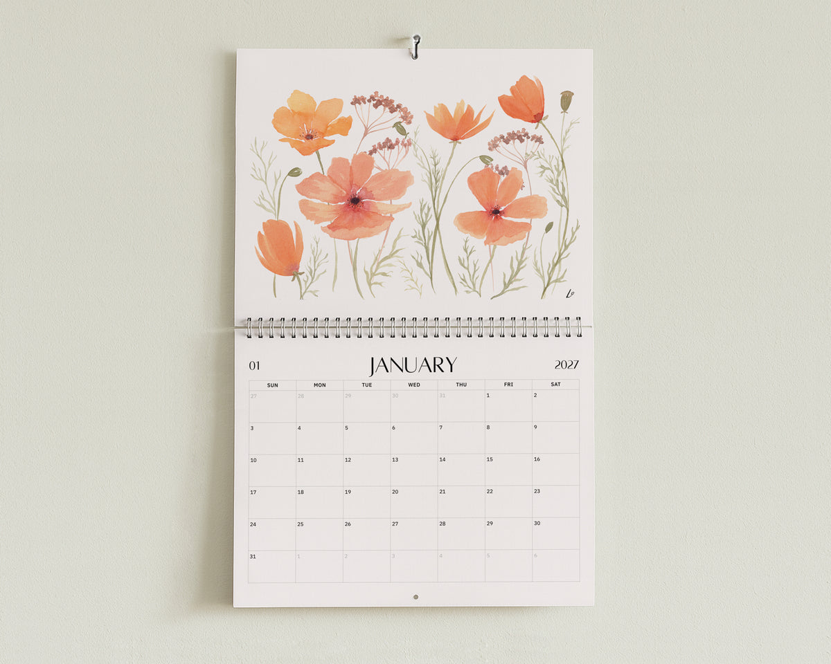 Wild Botanical 2027 Wall Calendar by Lydia Orange, open at January: watercolour painting above the January dates