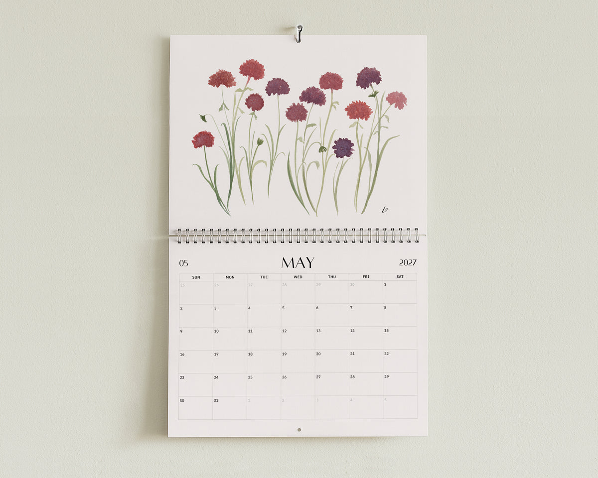 Wild Botanical 2027 Wall Calendar by Lydia Orange, open at May: watercolour painting above the May dates